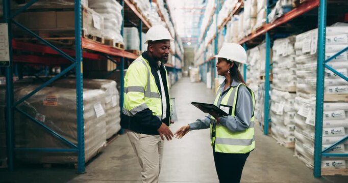 Business people, team and handshake with tablet at warehouse for quality control or logistics. Businessman and woman shaking hands with technology for storage, supply chain or distribution at depot