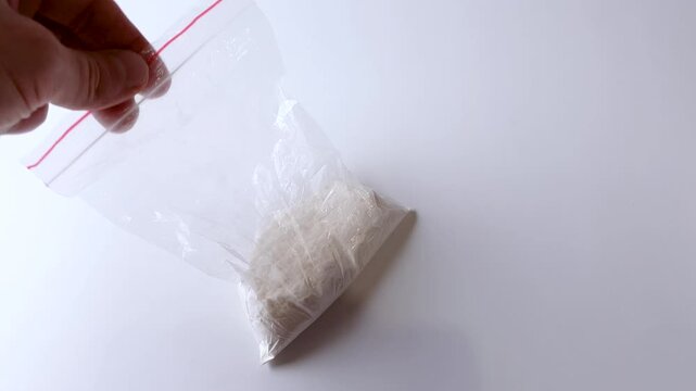 Bag of white narcotic substance. ZIP bag transparent with white powder, narcotic substance.