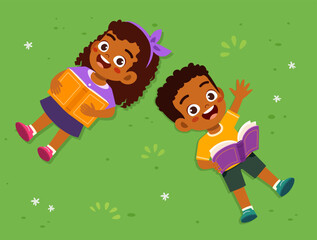 little kid lay down and read book on park and feel happy