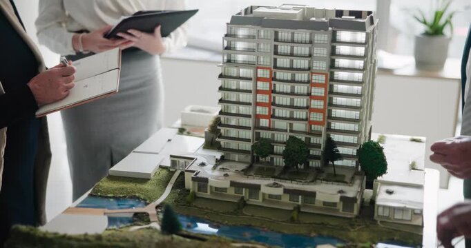 Employee, meeting and discussion for architecture in office, model maker and innovative design process. Property development, engineering and building or 3d prototype, project and professional people