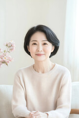 Elegant Middle-aged Woman with a Warm Smile in a Cozy Home Environment