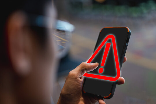Smartphone with power off or shut down button. woman hand finger touch mobile phone screen press power off button. cellphone application symbol for stop.