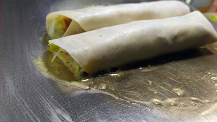 Delicious kebab made on the grill containing meat and vegetables