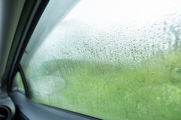 wet condensation on car window drivers side