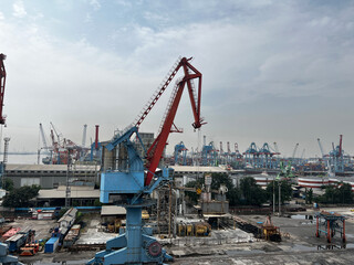 Container Ship Docked In The Port For Loading And Unloading Containers