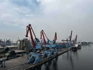 Container Ship Docked In The Port For Loading And Unloading Containers