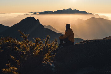 Obraz premium A person on the top of mountain
