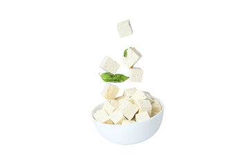 PNG,Cubes of tofu in a bowl with leaves, isolated on white background