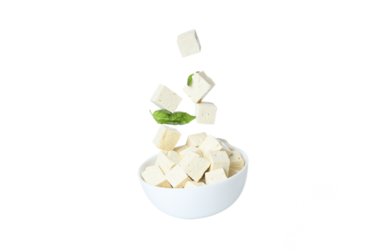 PNG,Cubes of tofu in a bowl with leaves, isolated on white background