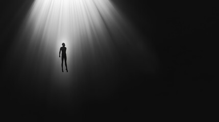 Obraz premium Contemplating Dark Depths - Silhouette of Person Descending into Void with Overhead Light, Symbolizing Deep Thoughts and Depression against Minimalist Background