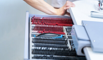 Selective focus at trial frame. Optometry equipment, Test rim for checking the vision. Set for diagnostics and selection of lenses diopters. A tool for oculist glasses for diagnosing vision