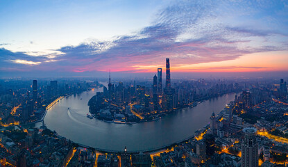Obraz premium Aerial view of modern city skyline and buildings at sunrise in Shanghai