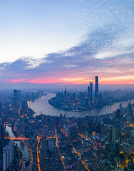 Obraz premium Aerial view of modern city skyline and buildings at sunrise in Shanghai