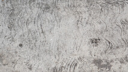 Attractive modern raw and uneven concrete wall surface handmade gray texture with visible natural traces, texture and mortar structure