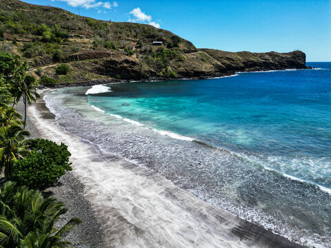 Famous grey sand beach, view from a drone in Hiva Oa, French polynesia, Marquesas