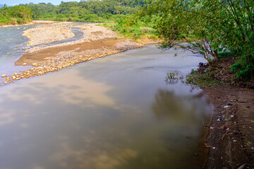 River view with calm water during the day 