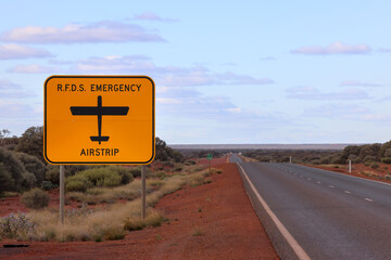 Sign of Royal Flying Doctor Service (RFDS) emergency airstrip, next to road, Western Australia Outback