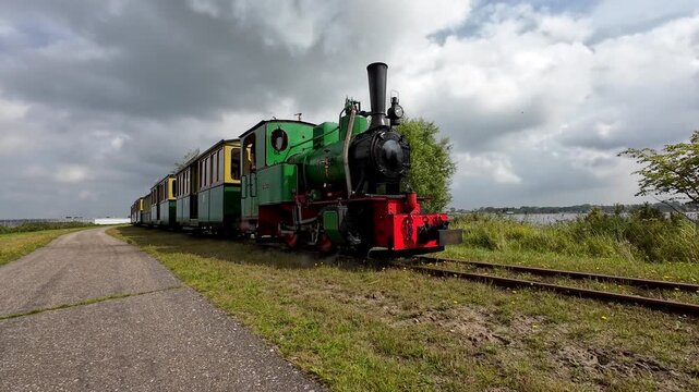 Steam, dances and twirls, whispering secrets of engine&rsquo;s soul to the wind