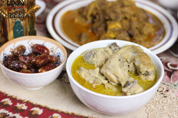 Selective focus of Opor Ayam (Indonesian chicken curry). Special Dish Served during Eid Mubarak or lebaran in Indonesia