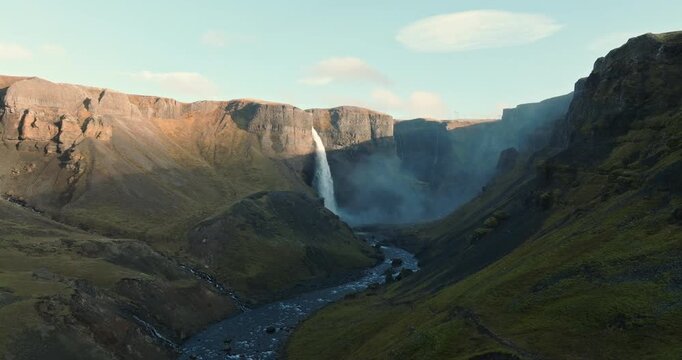Haifoss Waterfall Flowing Through The River Below The Canyons