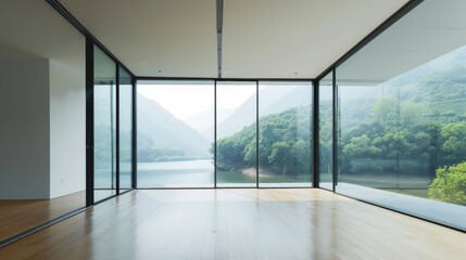 Fototapeta premium A spacious living room with blurry green mountains in the distance and a river in the foreground. An open space. Large floor-to-ceiling windows with very thin black frames.