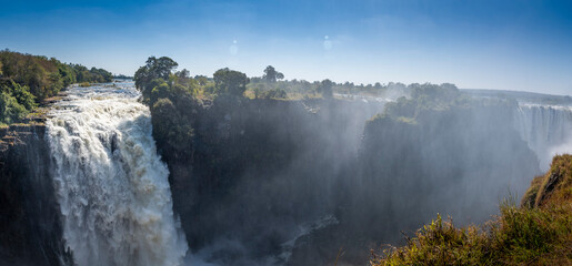 Victoria Falls, Mosi-oa-Tunya, is a waterfall on the Zambezi River, located on the border between...