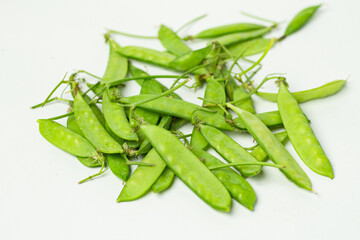 Snow peas isolated on white background.