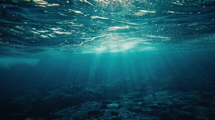 Fototapeta premium Sunlight Beams Through the Ocean Depths