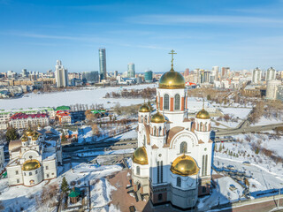 Winter Yekaterinburg and Temple on Blood in beautiful cloudy sunset. Aerial view of Yekaterinburg,...