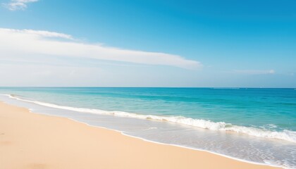 Fototapeta premium Tranquil Beach with Blue Sky and White Clouds.