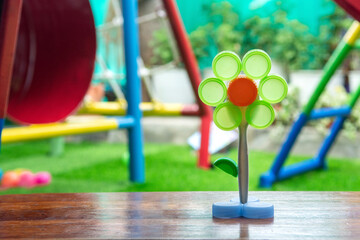 flower crafts made from used plastic made by kindergarten children