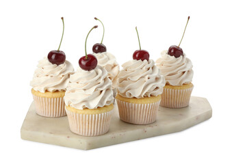Delicious cupcakes with cream and cherries isolated on white