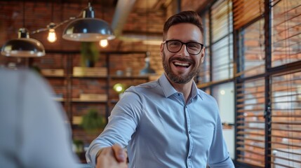 Fototapeta premium The smiling businessman handshake