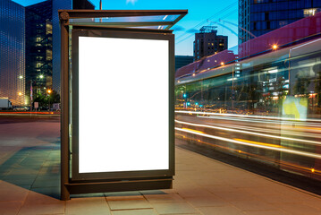 Blank Street Billboard Mockup For Outdoor Poster Advertising At The Bus Stop At Night. Public Media Screen With Long Exposure Light Trails
