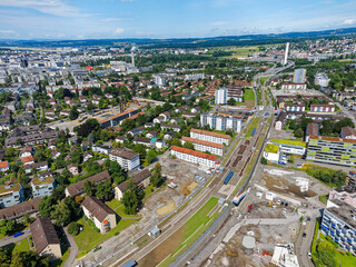 Aerial view over Swiss City of Zürich with highway enclosure and public park on a sunny summer morning. Photo taken August 6th, 2024, Zurich, Switzerland.