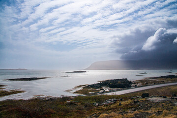 Iceland Landscape with ocean, mountains, coast, sky and clouds