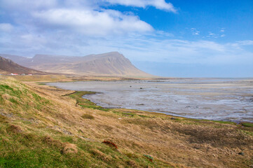 Iceland Landscape with ocean, mountains, coast, sky and clouds