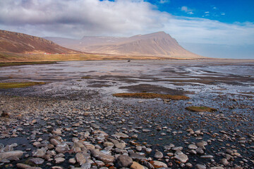 Iceland Landscape with ocean, mountains, coast, sky and clouds