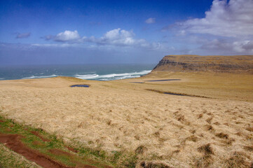 Iceland Landscape with ocean, mountains, coast, sky and clouds