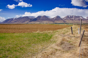 Landscape in Iceland with Mountains, sky and clouds