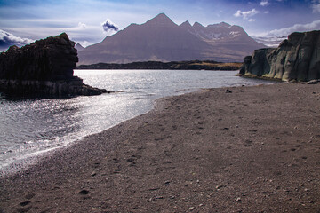 Iceland Landscape with ocean, mountains, coast, sky and clouds