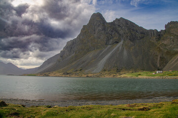 Iceland Landscape with ocean, mountains, coast, sky and clouds