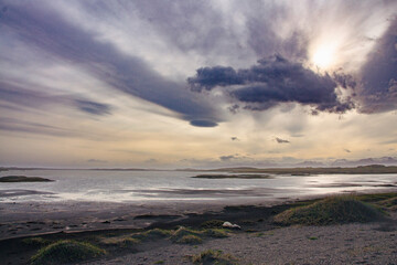 Iceland Landscape with ocean, mountains, coast, sky and clouds