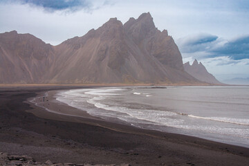 Iceland Landscape with ocean, mountains, coast, sky and clouds