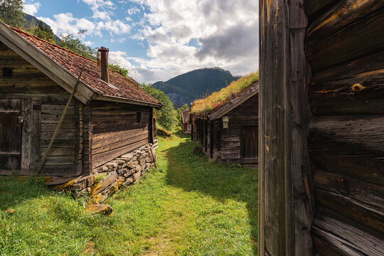 A path or street leading through a traditional Norwegian village.