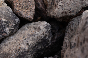 Beach rocks bottom on sunny day.