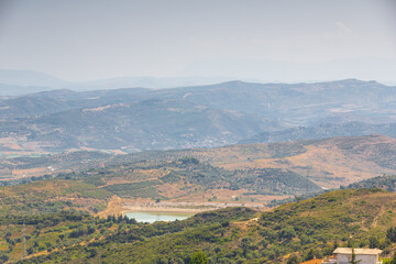 the ruines of Kanin&euml; Castle which was built in the nearby village and the city of Vlore. It is located on the side of the Shushic&euml; Mountain, about 380 metres above sea level and has views on the ocean