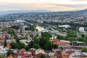 Obraz premium Bridge of Peace, Mtkvari (Kura) river, Rike Music Theater and Exhibition Center, State Palace of Ceremonies, Public Service Hall - House of Justice. Rike district