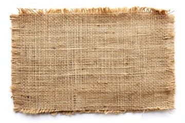Rustic, distressed, and torn burlap sackcloth fragment lies isolated on a clean white background, showcasing its rugged, woven fabric texture and earthy, natural tones.
