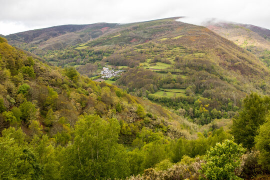 View of small village between mountains and forests. Paderne de Courel. lugo